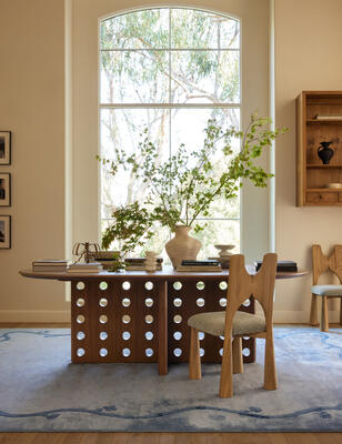 The Reika dining table features a design that feels airy yet grounded 